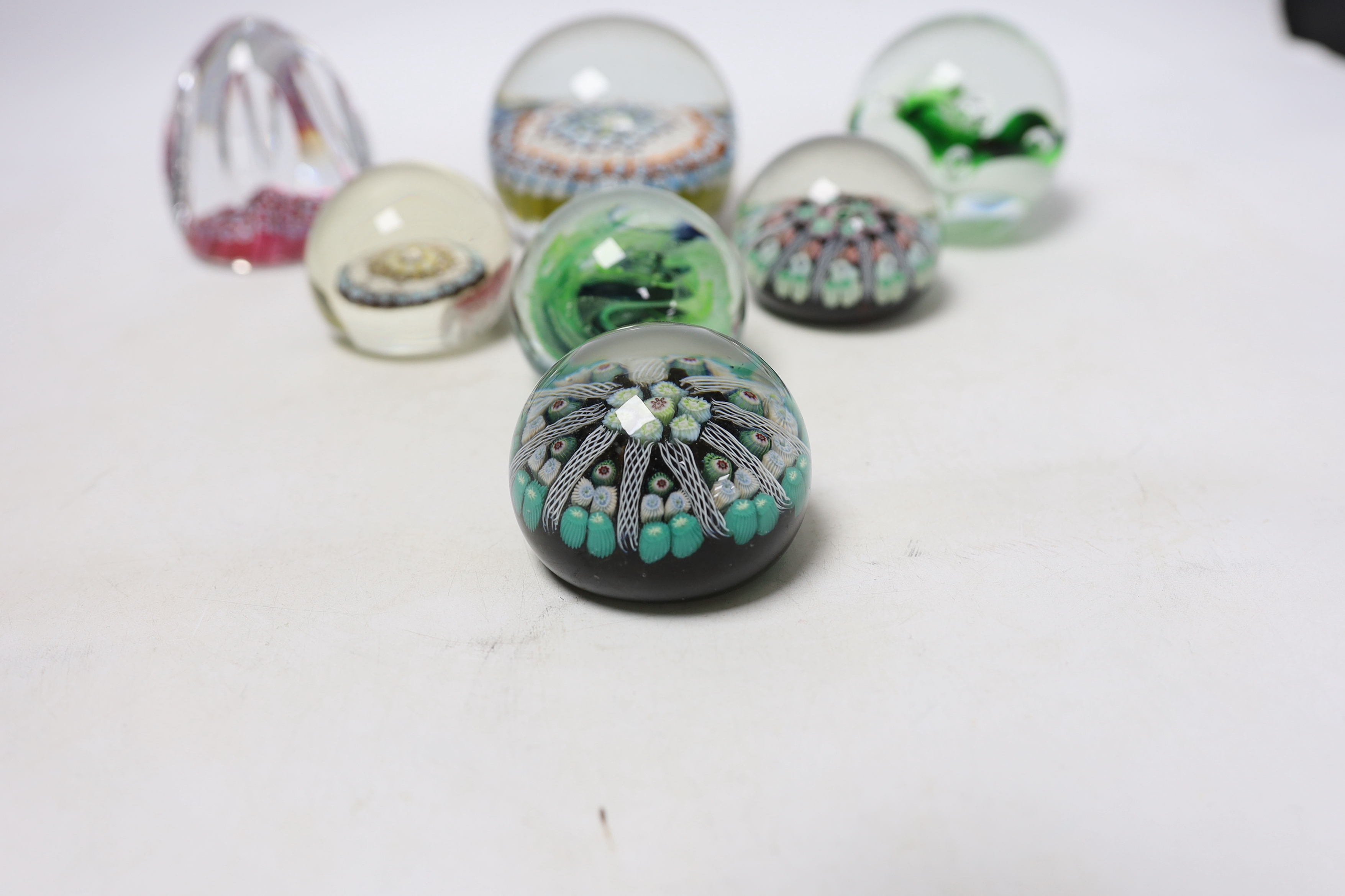 Seven Whitefriars and other paperweights, largest 8cm wide